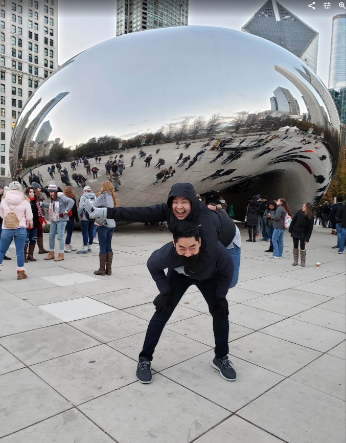 A playful moment in front of Cloud Gate in Chicago